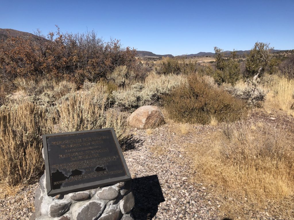 Signage displaying National Historic Landmark designation for the Mountain Meadows Massacre site.